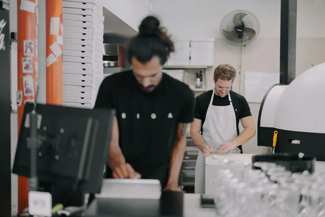 The Biga team behind the counter